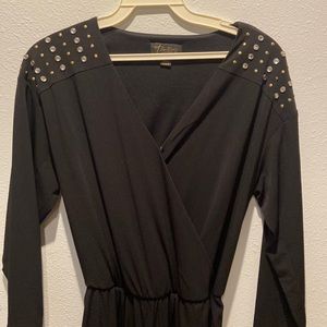 Thalia Sodi black studded jumpsuit. Snapped front